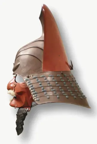 A red-laced samurai helmet, the bowl and neck-guard only