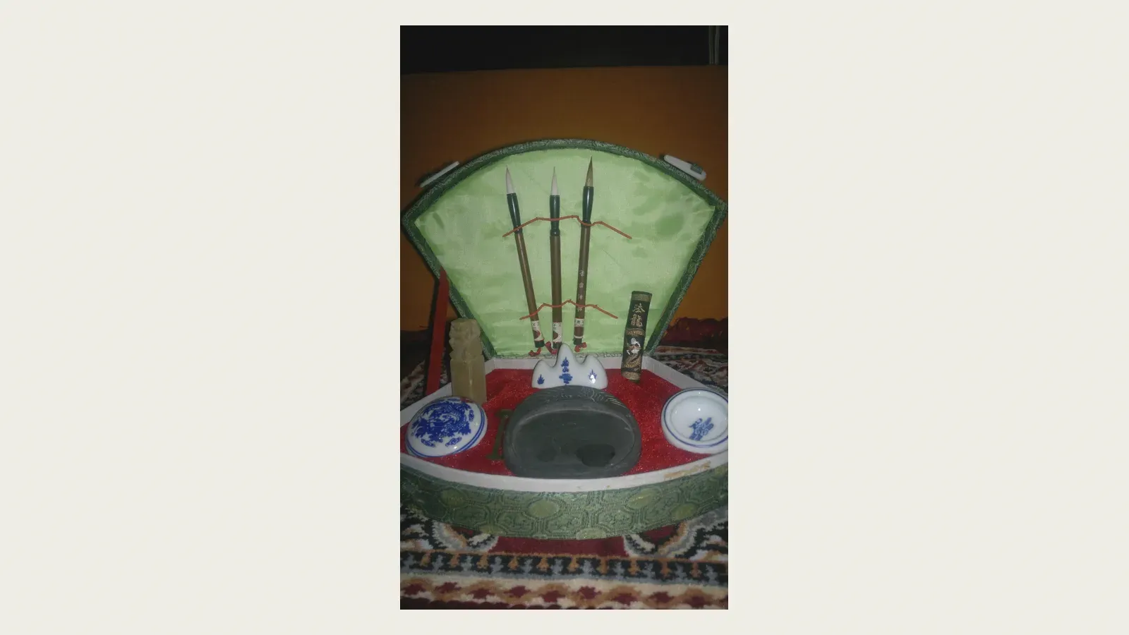 An inkstone, brush and seal — the scholar's writing tools