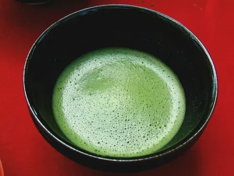 Thin whisked matcha, foam covering the surface of the bowl